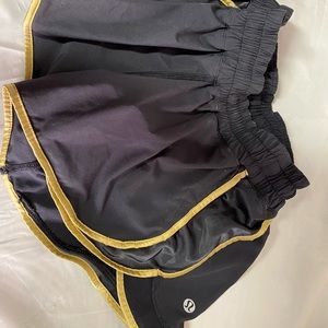 Lululemon RARE hotty Hot Short black and gold size 4